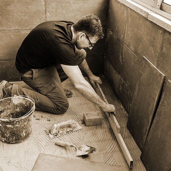 Pose carrelage extérieur sur dalle béton