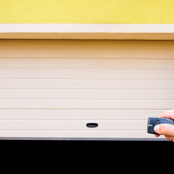 Installateur porte de garage sectionnelle motorisée